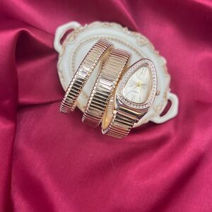 Elegant Gold Snake-Wrap Bracelet Watch with Crystal Accents Serpenti